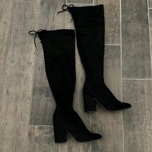 Black (over the knee) suede boots.